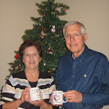 Dan's parents proudly display their grandparent mugs, Christmas 2009