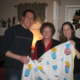 Dan's grandmother gives us a quilt she made for our baby
