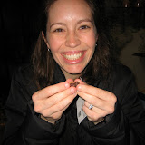 Katie cracks open a cocoa bean