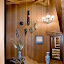 The main entry of the Sycamore Retreat features wood masks from around the world.