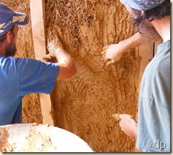 Plastering the first section of wall