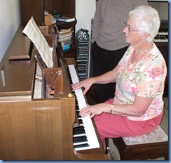 Dorothy Waddel showing her piano talents on the Schimmel