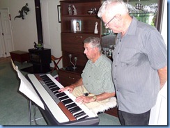 Michael Bramley playing the Korg SP250 keyboard