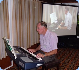 Len Osbourne playing his Korg Pa500 keyboard