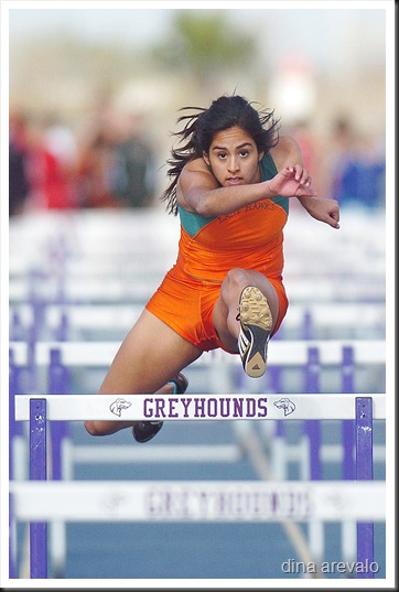 Harlingen South's Zariah Noyola competes in the girls 100 meter hurdles at the Bobby Morrow Relays in San Benito Friday afternoon.  Noyola placed first in the race.  (Dina Arévalo/Valley Morning Star)