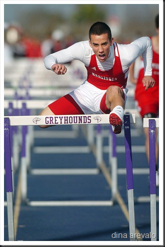 Harlingen High's Randy Bermea clears the last hurdle of the 110 meter boys high hurdle race at the Bobby Morrow Relays in San Benito Friday.  Bermea won the race with a time of 14.16 seconds. (Dina Arévalo/Valley Morning Star)