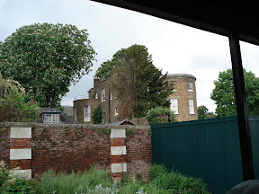 They'd just discovered a tunnel behind the green wall dating back at least 300 years (I think) which lead to a pub in town.  Go figure!