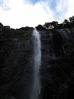 One of many water falls coming down into Milford Sound
