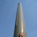 South Koreans love to give a backwards hug to large metal cylinders.