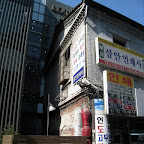 Koreans love building new buildings around old buildings.