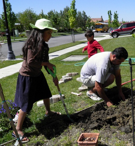 [ella gardening with dad[4].jpg]