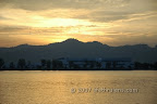 Sunset view from the resort's beach. The white building is Agilent Technologies in Penang Island Sunset view from the resort's beach. The white building is Agilent Technologies in Penang Island