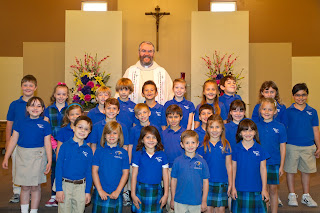 Fr. Dennis with the 1st and 2nd Grade Fr. Dennis with the 1st and 2nd Grade