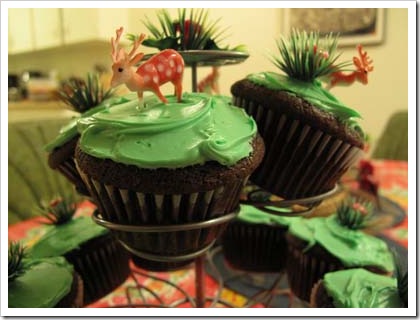 cake toppers with mushrooms grass and deer
