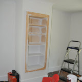 Priming the new built in bookcase.