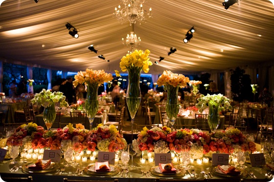 Amazing head table floral centerpieces vibrant