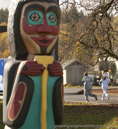 [Cowichan Band member runs the Olympic Torch[1].jpg]
