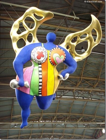 The Guardian Angel by Niki de St. Phalle can be seen floating high in the cavernous space of the Zurich Hauptbahnhof