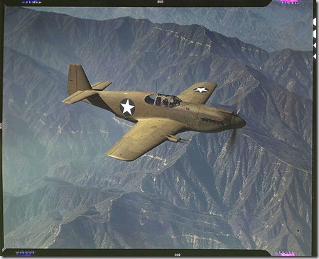 P-51 'Mustang' fighter in flight. Inglewood, California, October 1942. Reproduction from color slide. Photo by Alfred T. Palmer. Prints and Photographs Division, Library of Congress