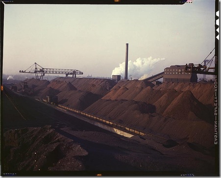 Hanna furnaces of the Great Lakes Steel Corporation, stock pile of coal and iron ore. Detroit, Michigan, November 1942. Reproduction from color slide. Photo by Arthur Siegel. Prints and Photographs Division, Library of Congress