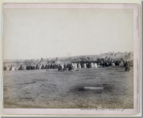Title: Indian Council in Hostile Camp
Rear view of a large semi-circle of Lakota men sitting on the ground, with tipis in background, probably on or near Pine Ridge Reservation. 1891.
Repository: Library of Congress Prints and Photographs Division Washington, D.C. 20540