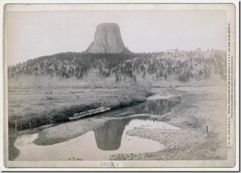 Title: Devil's Tower
Distant view of Devils Tower and reflection of tower in stream in foreground. 1890.
Repository: Library of Congress Prints and Photographs Division Washington, D.C. 20540