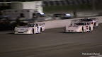 Good race action between #70 Jeff Hanley, #7 Derrick Tiemersma and #9 Brandon Watson at Kawartha Speedway, August 6, 2010