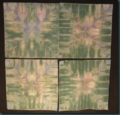 Four broadcloth squares folded and dyed Four broadcloth squares folded and dyed