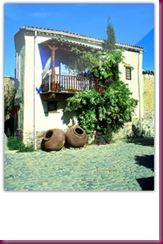 a-small-house-and-terracota-pots-in-cyprus