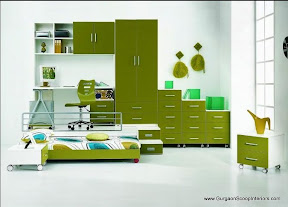 Enough Storage Space where you can keep every belonging of your kids and with the dark green furniture and light green wall color.