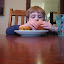 David eats the banana muffins he made with Mommy the day before. &ndash; 22-May-2010