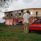  &ndash; © 2008 NHA Photos, James B. Mansaray, photographer. September 2008....Father Seraphim facing East begins his prayers at the beach.
