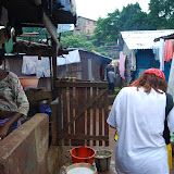  &ndash; As Vicki leaves the clinic she begins to hand out small items (toothpaste, band aids, what little she has) …. © 2008 September NHA Media Photos, Salu Bangura, photographer.