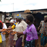  &ndash; Vicki gives what aid she can find to give...…. © 2008 September NHA Media Photos, Salu Bangura, photographer.