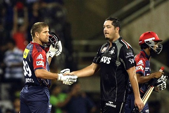 [Delhi Daredevils' batsman James Hopes, left, is congratulated by Pune Warriors'[3].jpg]