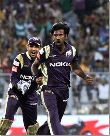 Kolkata Knight Riders bowler Lakshmipathy Balaji, right, celebrates a wicket-ipl-2011
