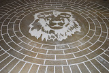 circular_brick_school_logo_concrete_stain_engraving.jpg