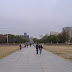 Picture of the peace memorial park with cenotaph and a-bomb dome in the background.