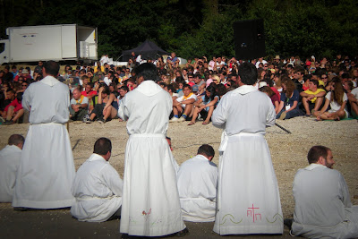 seven white robed priests