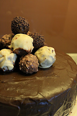 Chocolate cake with Bittersweet Ganache and tower of tri-colored Ferrero Rochers