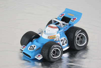 игрушечный Tyrrell Джеки Стюарта в стиле комиксов Jim Bamber