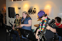 Lydia rips a solo while Nathan ponders the deeper implications on the moment.
