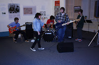 The PMAC youth rock band moves some air.
