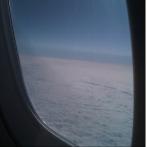 Clouds through an airplane window