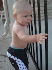 Noah was more interested in walking around outside the pool.