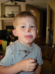 Brownie batter all over...even in the hair!