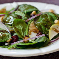 Baby Spinach Salad with Pears, Red Onions, Cranberries and Toasted Hazelnuts