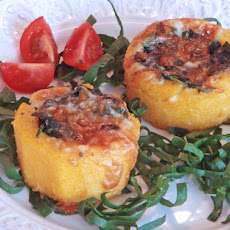 Polenta baskets with sautéed spinach and Taleggio cheese