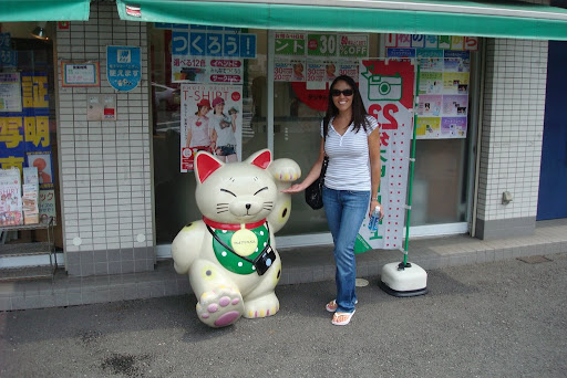 Alicia with Cat outside store