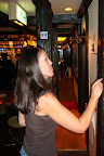 Alicia playing darts